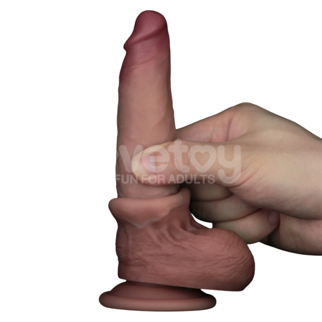 fingers pulling down outer skin from 7 inch Sliding Skin Pro II Dual Layer Silicone Dildo 