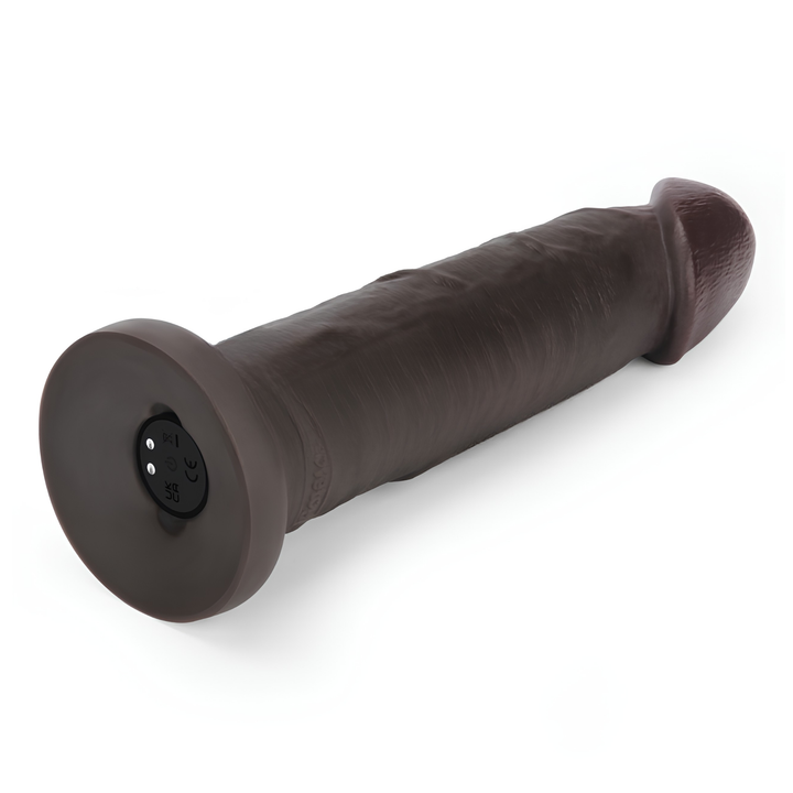 view of power button from vibrating model 9 inch Sliding Skin Pro II Dual Layer Silicone Dildo