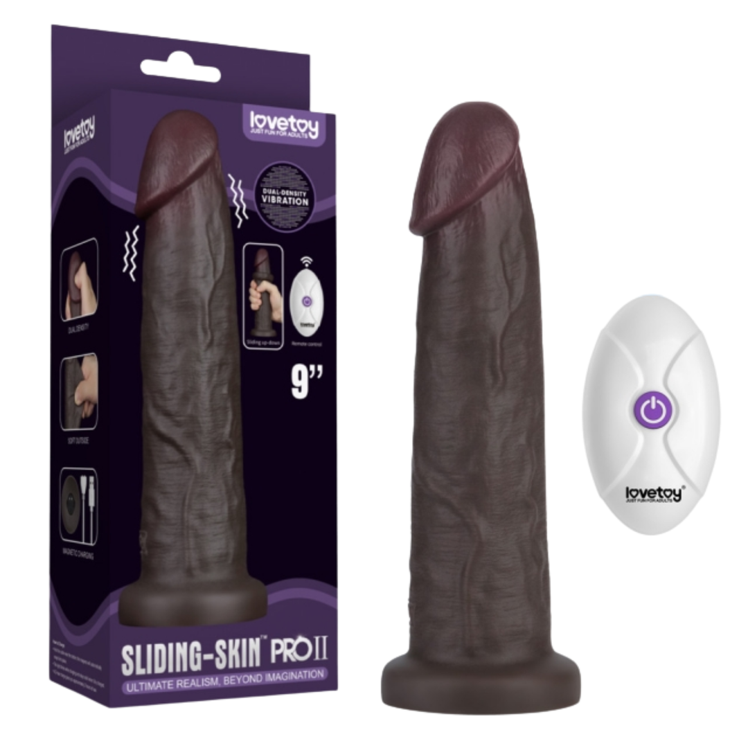 vibrating 9 inch dual density dildo in black as seen next to packaging 