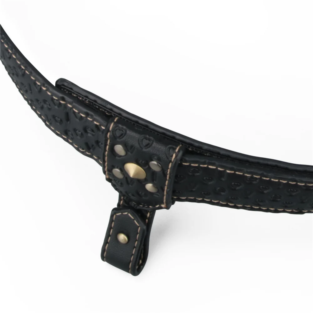 angled view of buckles from Rebellion Reign Strap-On Harness 