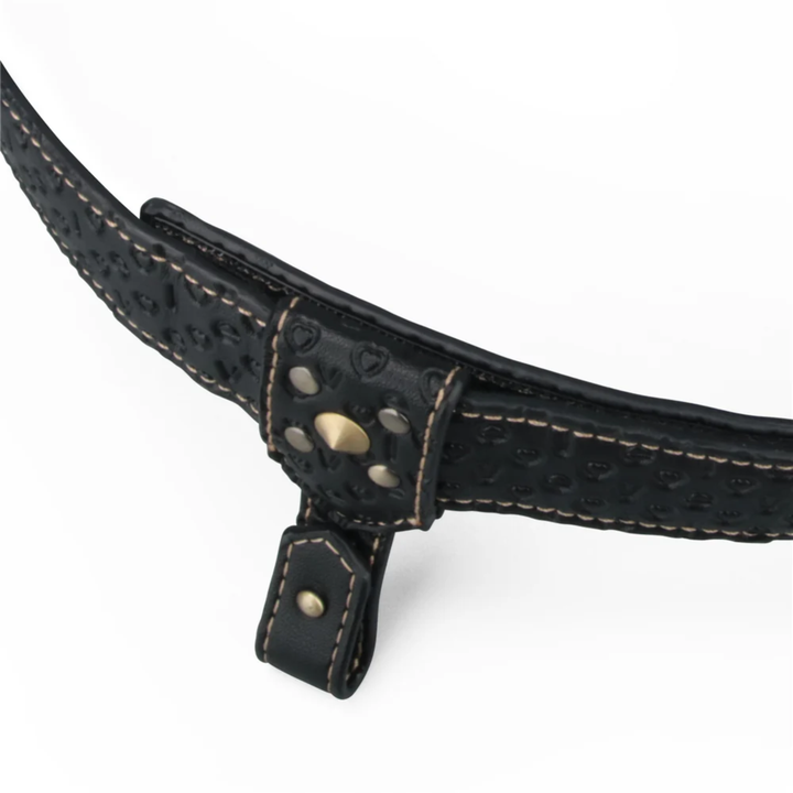angled view of buckles from Rebellion Reign Strap-On Harness 