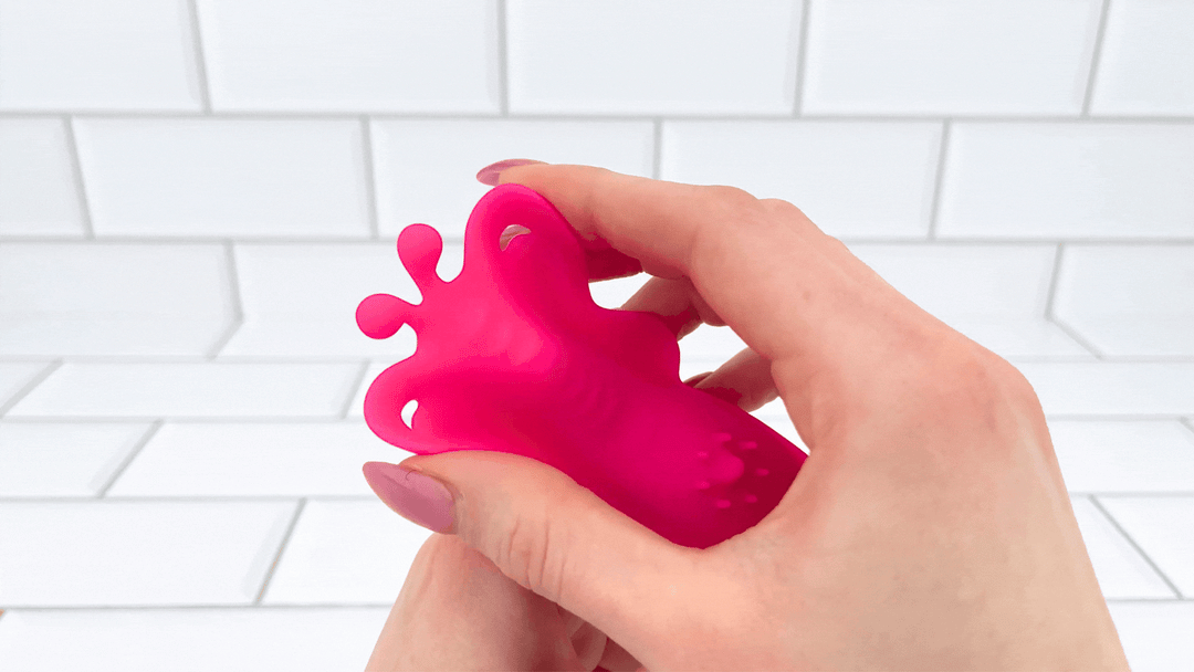 GIF of Wearable Butterfly Vibrator wings being bent to show flexibility 