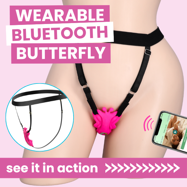 A pink and black wearable Bluetooth butterfly g-string shown on a mannequin torso against a pink background, with large text reading 'WEARABLE BLUETOOTH BUTTERFLY,' a circular inset of the product alone, and a phone screen showing a demonstration.