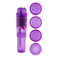 Purple clitoral stimulator with different caps for new sensations