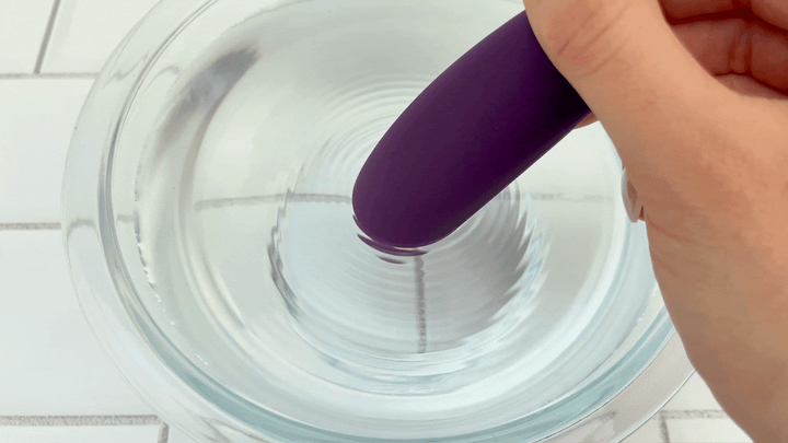 GIF of X-Strong Waterproof Clit Stimulator vibrating in bowl of water 
