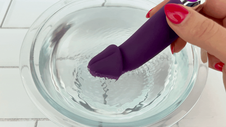 GIF of g-spot vibrating bullet tip vibrating in bowl of water 