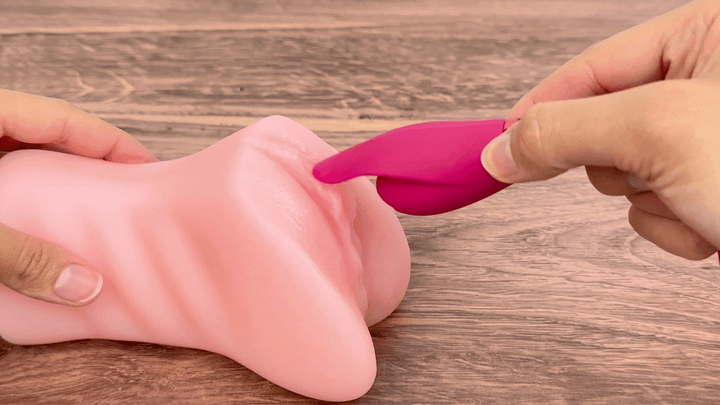 GIF of fluttering bullet end being used on a model of a vagina