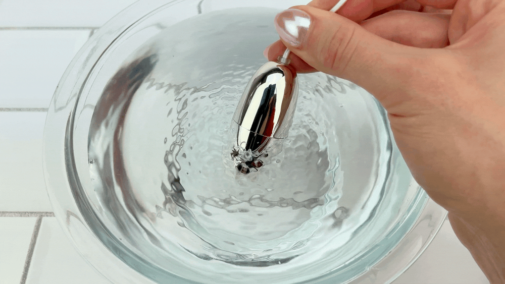 Clara's Silver Egg vibrating in bowl of water 