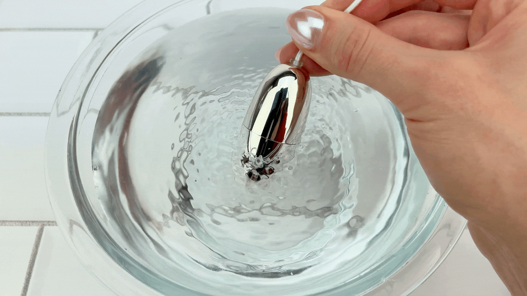 Clara's Silver Egg vibrating in bowl of water 