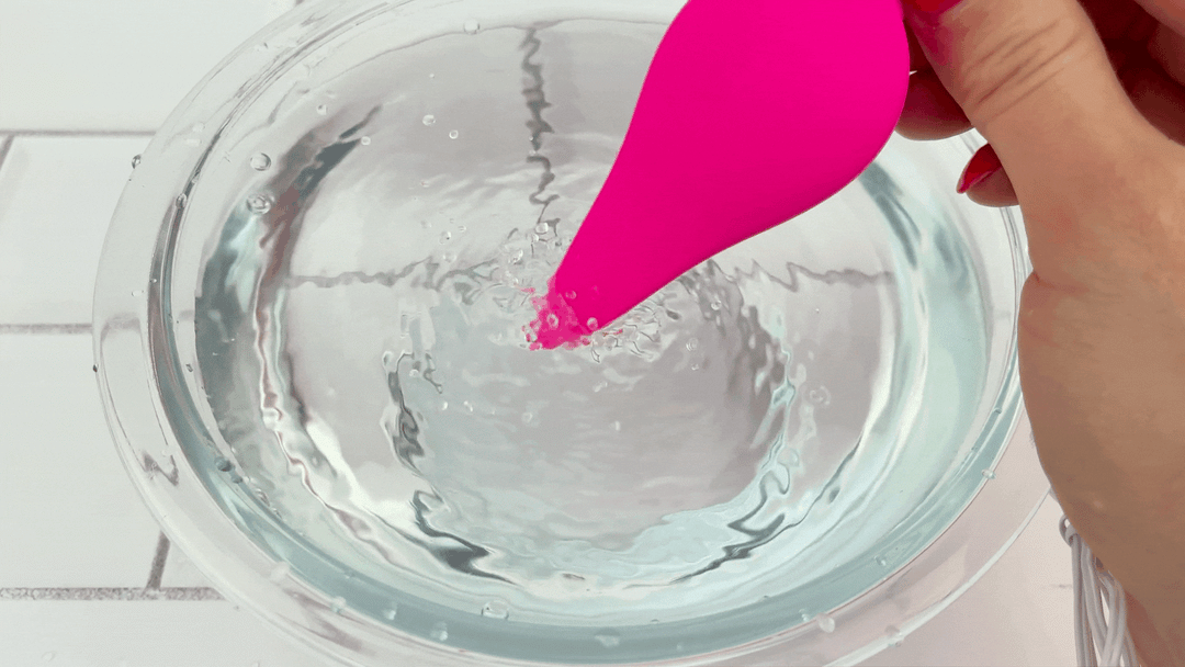 GIF of The Flutter Bullet vibrating in bowl of water 