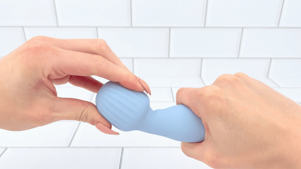GIF of neck from Mini Silicone Rechargeable Massage Wand being bent to show flexibility 
