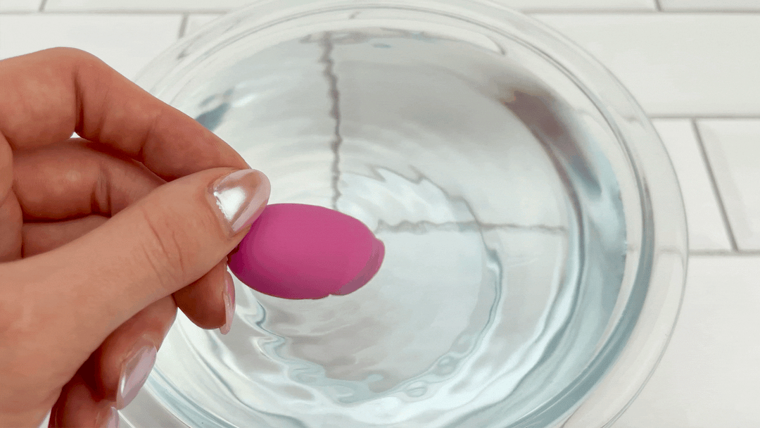 GIF of USB Plug-In Vibrating Bullet vibrating on lowest intensity in bowl of water