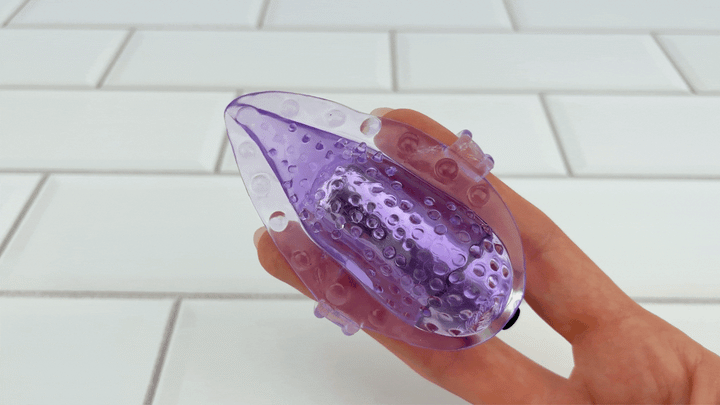 GIF of Vibrating Tongue Finger Sleeve with Clit Bullet on fastest setting 
