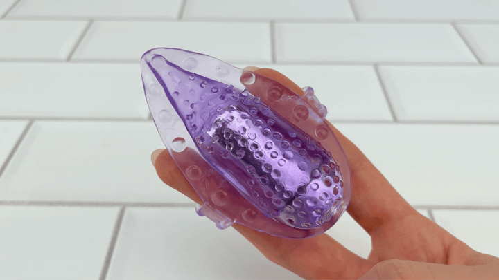 GIF of Vibrating Tongue Finger Sleeve with Clit Bullet on lower setting 