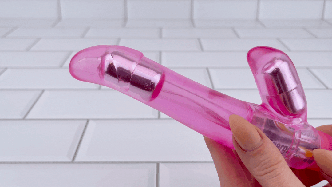 Bella's Curved Dual Stimulator Vibe in full motion 