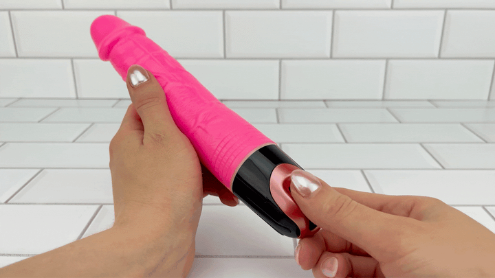 GIF of 9.5 Inch Long Veined Power Dildo being turned on 