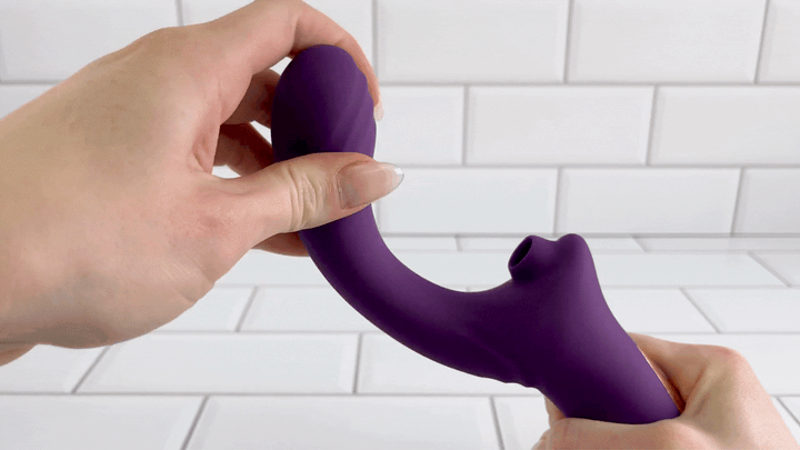 GIF of G-Spot Rabbit Vibrator with Suction being bent to demonstrate flexibility 