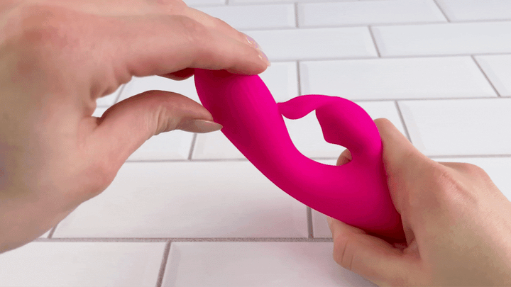 GIF of Mini Waterproof Rabbit Vibrator shaft being bent to show flexibility 