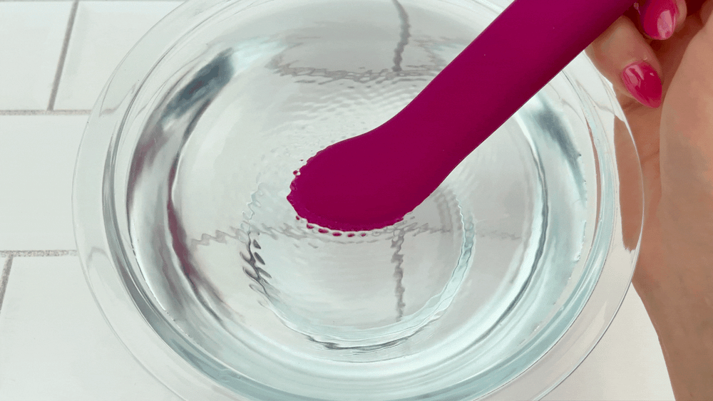 GIF of flexible g-spot vibrator by TooTimid vibrating on high intensity in bowl of water 