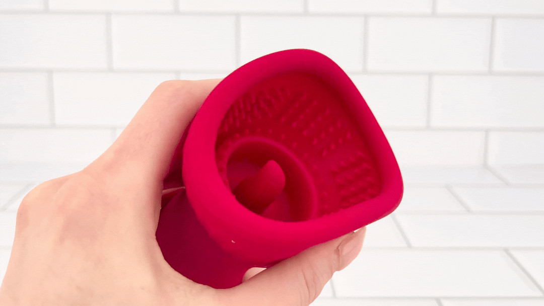 GIF of cup being squished to show soft material 