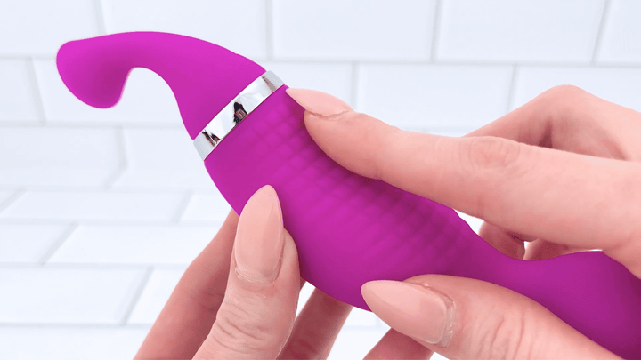 GIF of Duo Tease High Intensity Clit Sucker and Vibrator  finger brushed against textured handle 