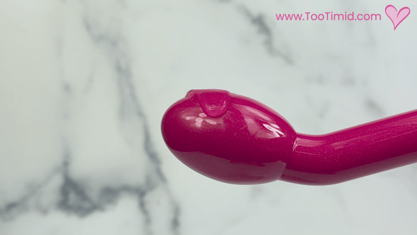 GIF of lube vibrating off of Rose G-spot vibrator 