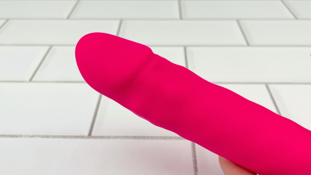 GIF of Thrusting Spinning Licking Dual Action Vibrator thrusting view of rotating beads 
