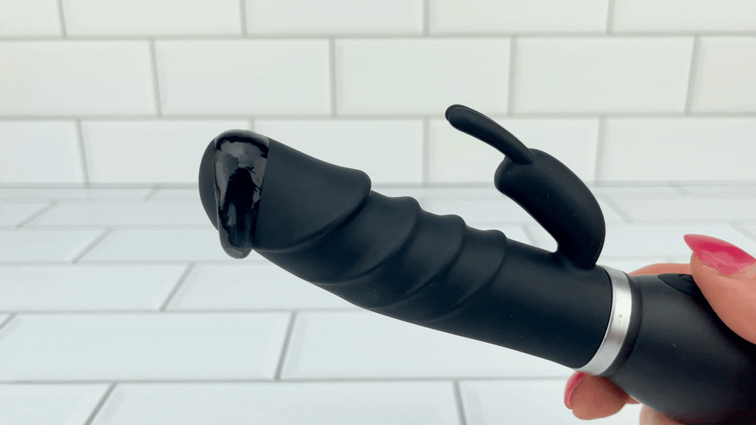 GIF of Beginner's Rippled Silicone Rabbit Vibe with lubricant on vibrating tip 