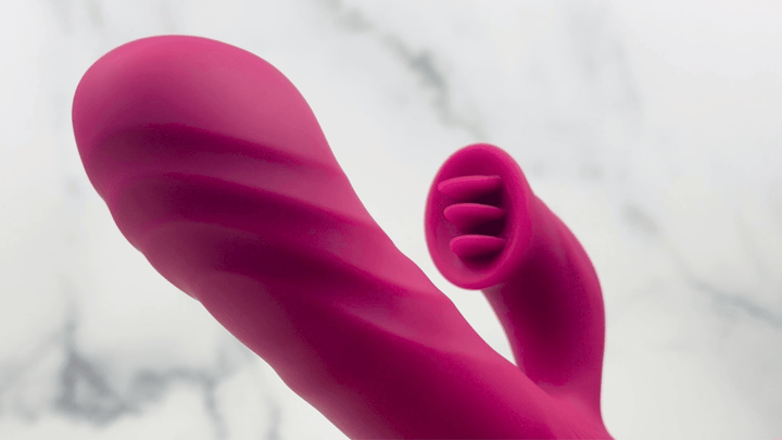 GIF of Revel Rabbit Silicone Fluttering and Fingering Dual Action Vibe tongues moving clit stimulation 