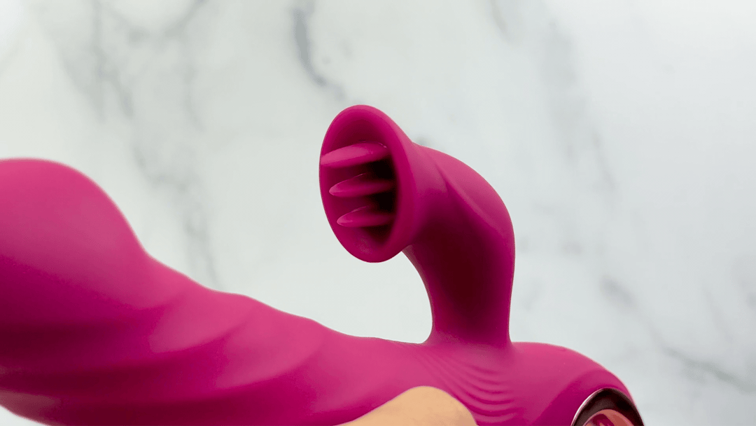 GIF of Revel Rabbit Silicone Fluttering and Fingering Dual Action Vibe close up of fluttering tongue 