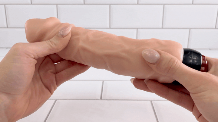 GIF of 9 Inch Ultra Veined Vibrating Dildo being bent to show flexibility 