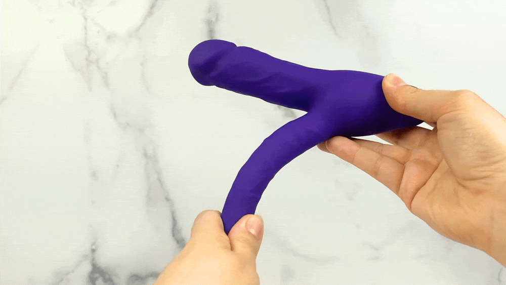 GIF of Silicone Double Penetrator anal shaft being bent 