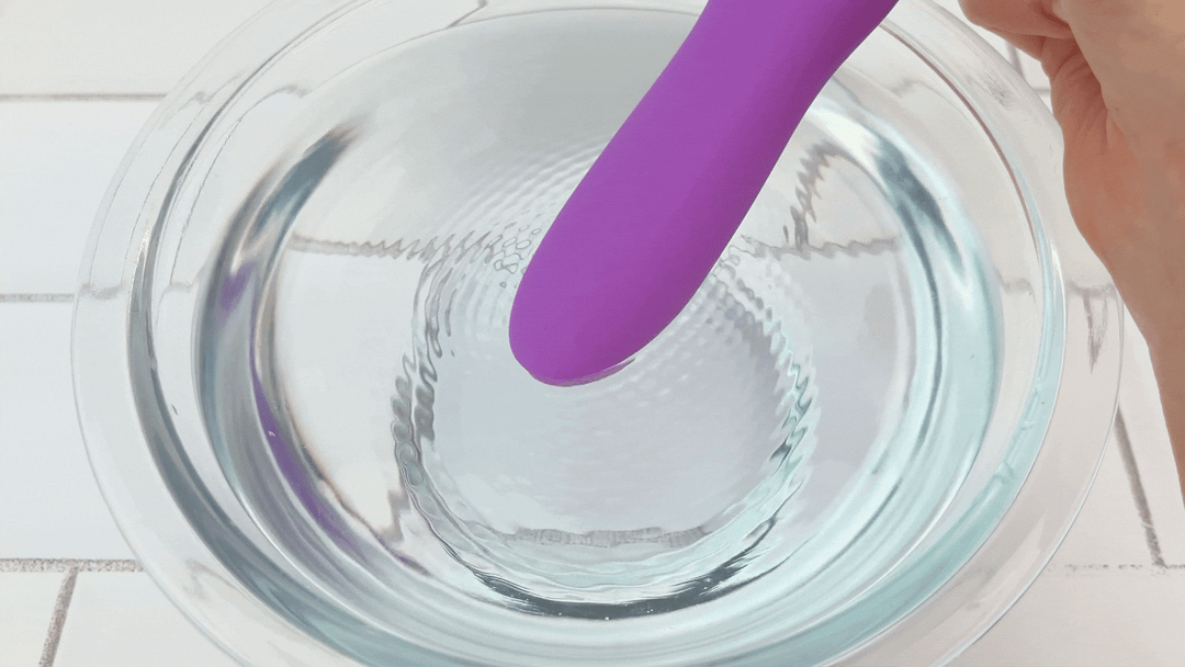 GIF of Beginner's Silicone Vibe vibrating on lower speed in bowl of water 