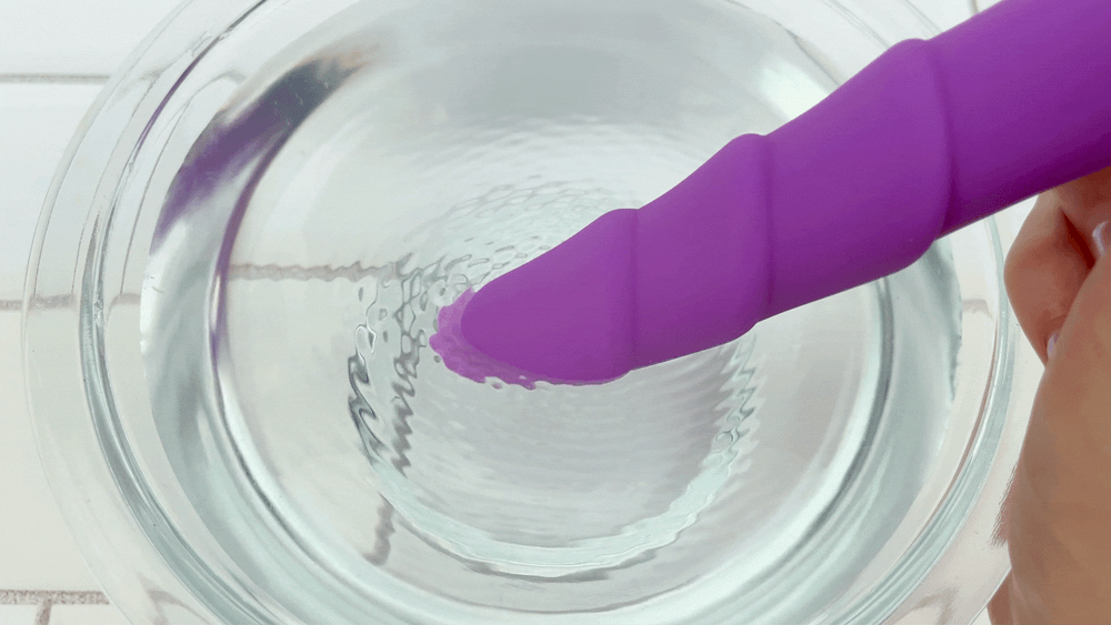 GIF of Rippled Silicone Vibrator tip vibrating in bowl of water