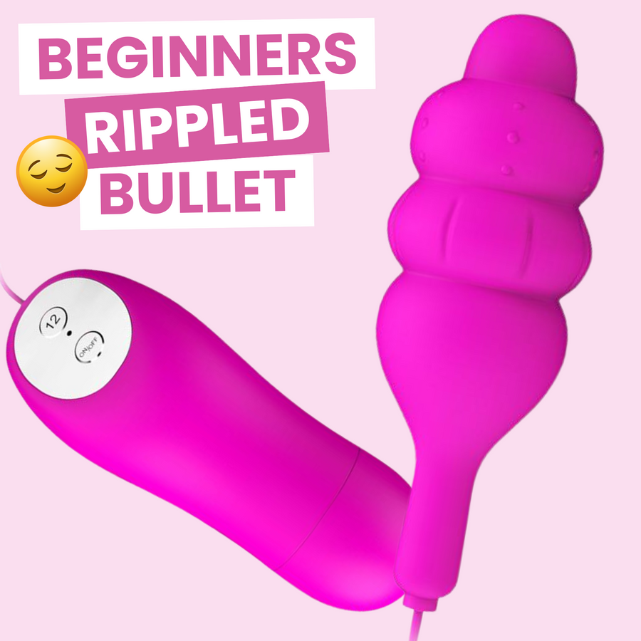 Pink beginners rippled bullet toy with text on a pink background