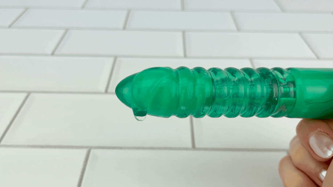 GIF of Roland's Ribbed Vibe with lubricant vibrating on tip 