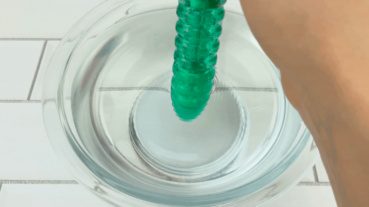 GIF of Roland's Ribbed Vibe vibrating in bowl of water 