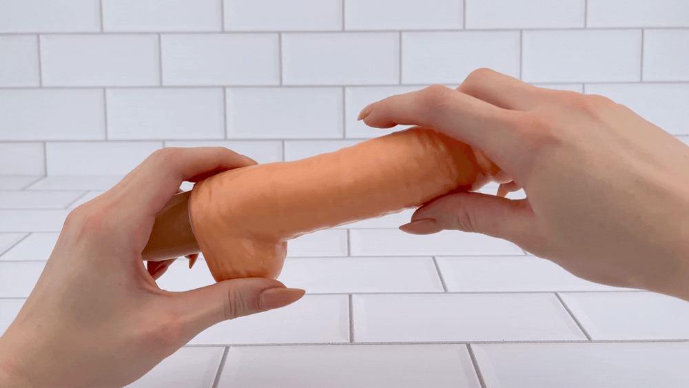 GIF of dildo vibrator average size shaft being bent posable 