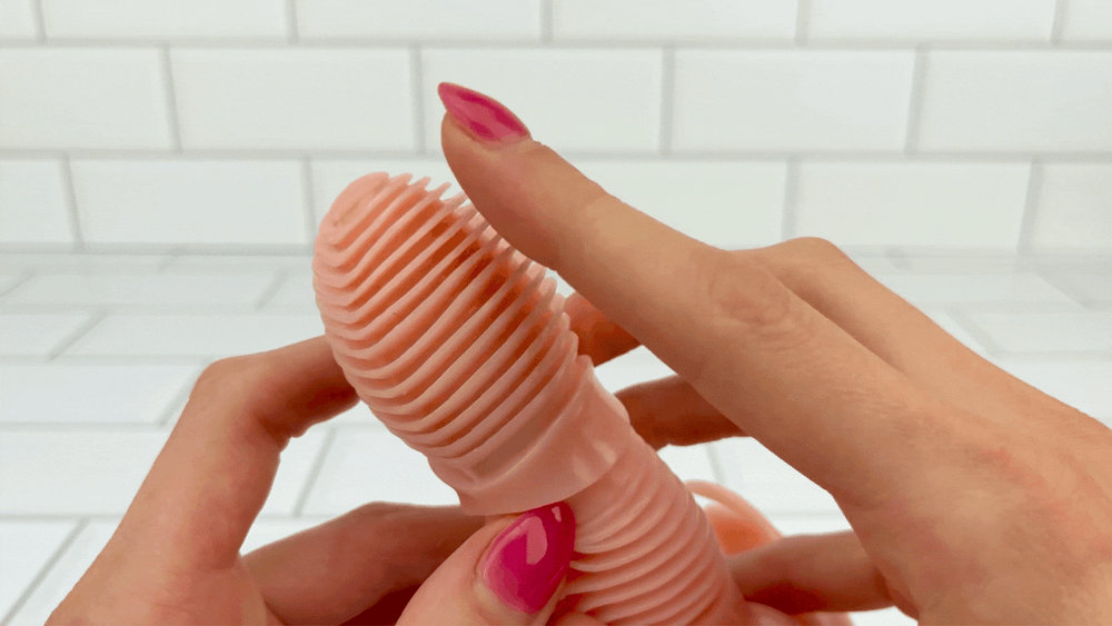 GIF of ripples from Rippled Triple Stimulating Power Vibrator being rubbed with thumb 