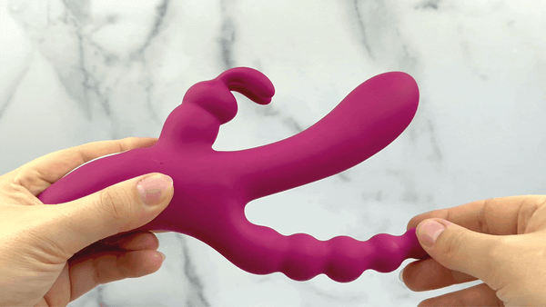 GIF of anal shaft from Waterproof Silicone Triple Rabbit Stimulator being bent to show flexibility 