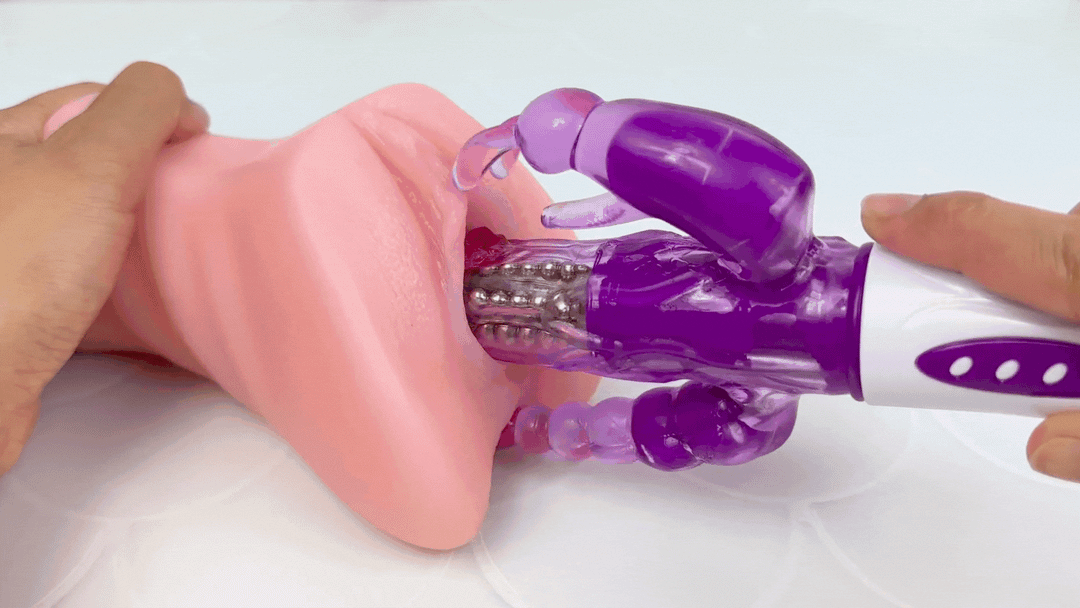 GIF of rabbit being used on a model of a vagina
