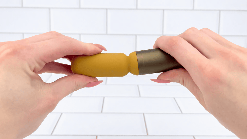 GIF of Luxury Slim Wand Vibrator being bent to show flexibility 
