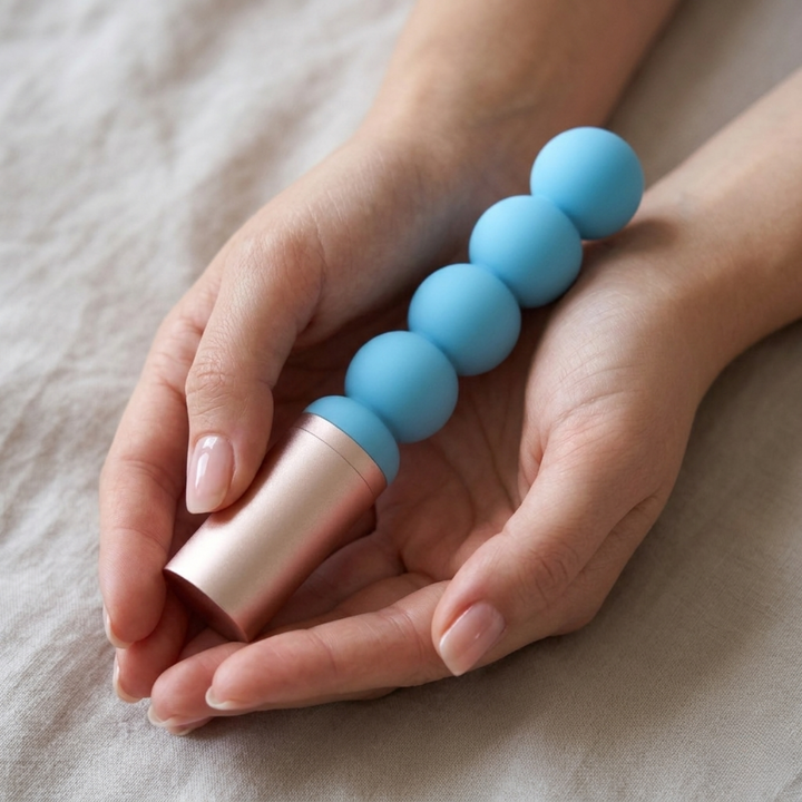 womans hands holding Luxury Beaded Wand Massager from TooTimid 
