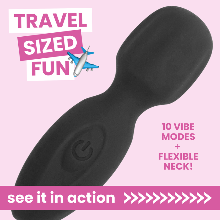 Black travel-sized electronic device with text on a pink background