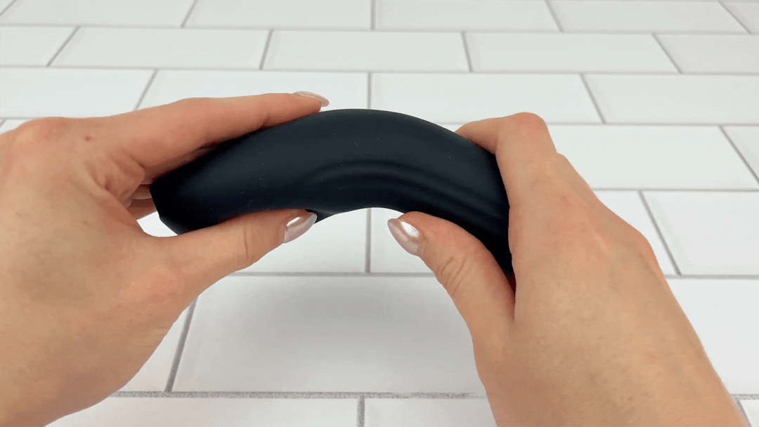 GIF of Vibrating Penis Tip Massager being bent to demonstrate flexibility 
