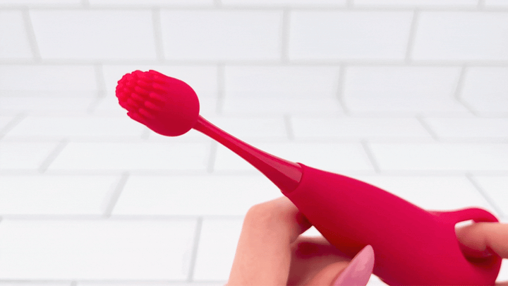 GIF of nubby attachment from Pinpoint Clit Vibe vibrating 