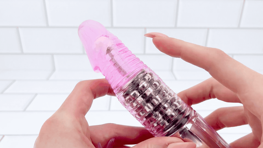 GIF of Rotating Rabbit Dual-Action Vibrator raised ribbed texture 
