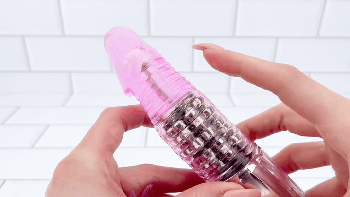 GIF of Rotating Rabbit Dual-Action Vibrator raised ribbed texture 
