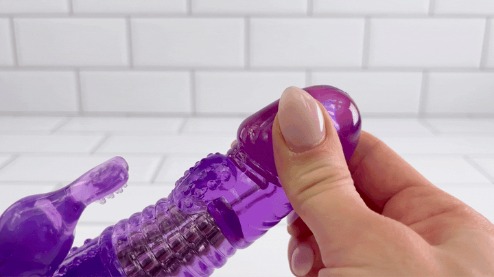 GIF of head from Ribbed Rotating Rabbit Vibe being squished to show softness 
