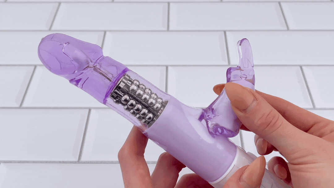 GIF of bunny neck being bent to show flexibility from Beginners Rotating G-Spot Massaging Rabbit Vibrator 